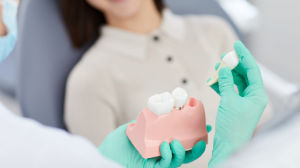 Dentist Discussing Oral Surgery with Patient